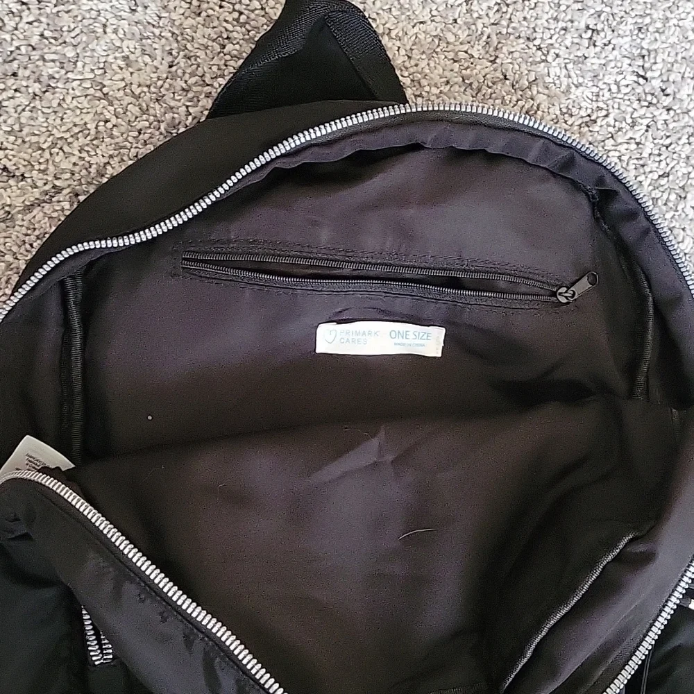 Black backpack - Picture 2 of 3